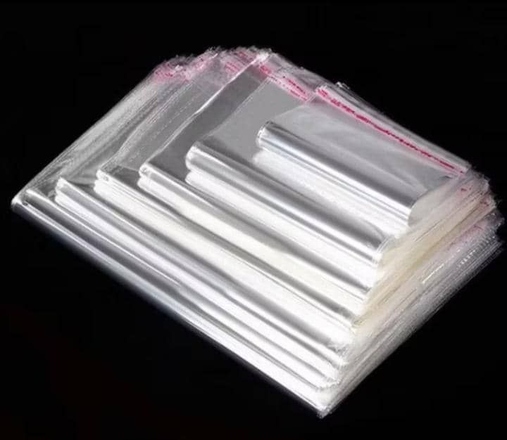 Self adhesive transparent OPP plastic bag (Size: 25cm x 35cm) -100's /pack