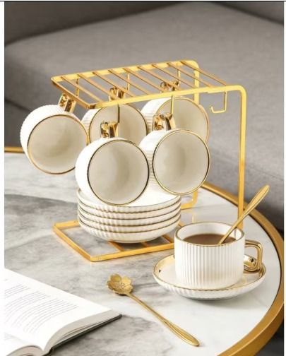 white and gold coffee cups